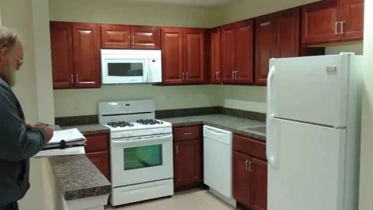 Rent Apartment Unit with Condo Fees Covered and Nearby Parking