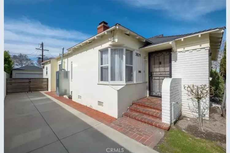 Buy House in Crenshaw Manor Los Angeles with Spacious Lot and Garage