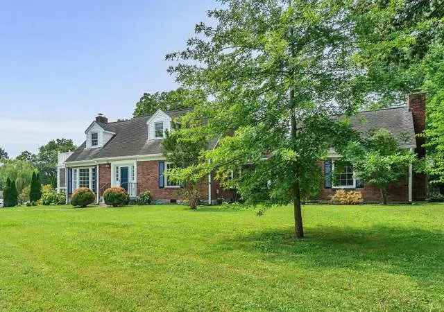 Buy Charming 3 Bedroom Home Inglewood with Fireplaces and Screened Porch