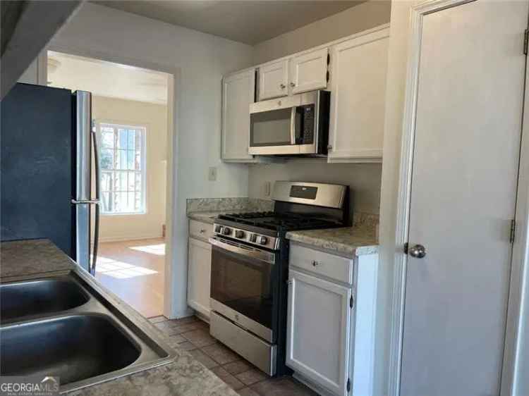 Buy Charming Townhome in Acworth with Spacious Layout and Private Deck