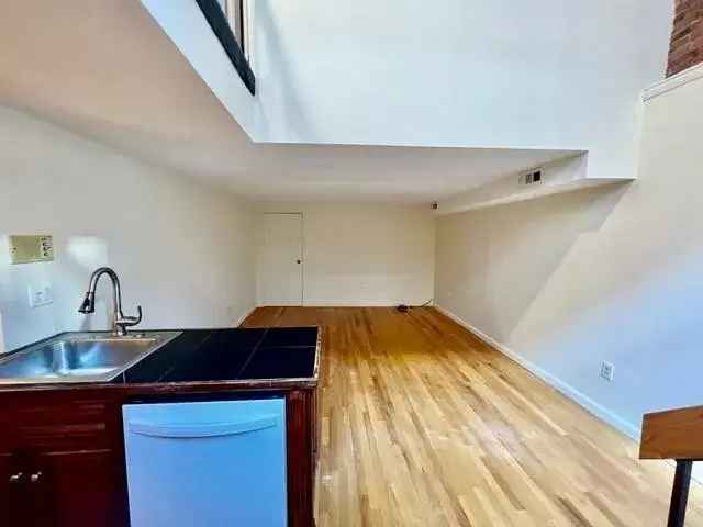 Rent Exquisite Lofted One Bedroom Duplex in North End Waterfront