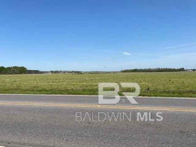 Buy Land in Foley with Level Cleared Parcel and County Road Frontage