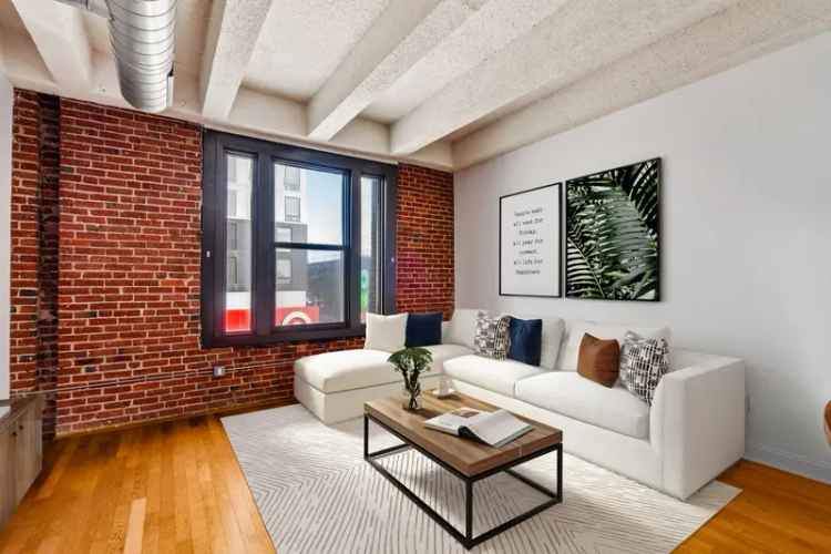 Rent 1 Bedroom Condo Avenue of the Arts Exposed Brick Hardwood Floors