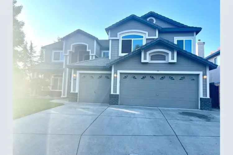 Spacious 2 Story Home for Sale with Designer Finishes and 6 Bedrooms