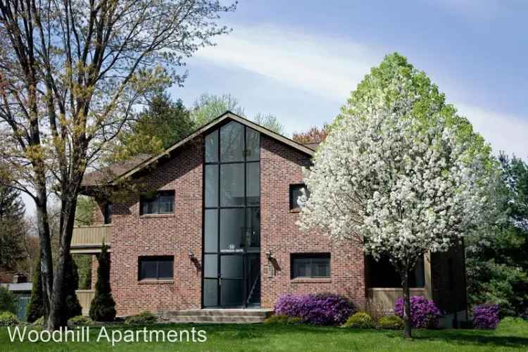 Rent Apartments with Balconies and Garage in Glenmont - Woodhill Apartments