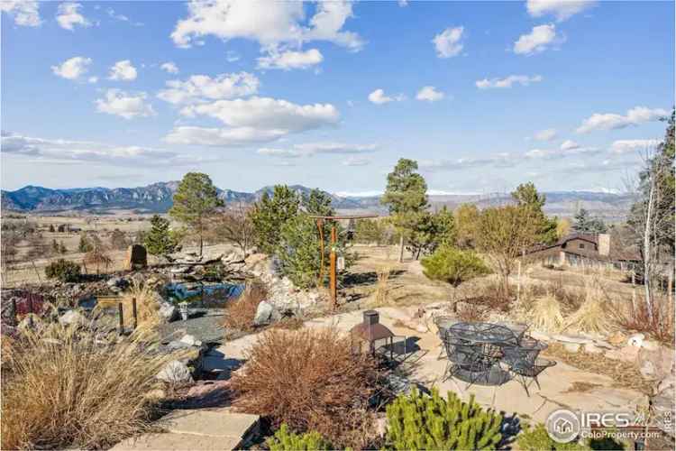 Luxury farmhouse for sale in Boulder with stunning mountain views and vineyard