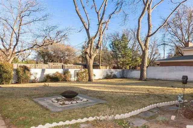 Luxury buy mid-century modern home in Abilene with butterfly garden