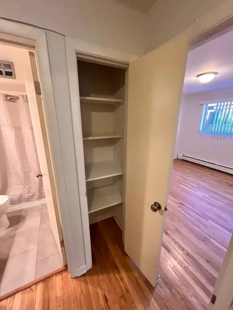 Apartment Unit for Rent with Updated Kitchen and Hardwood Flooring near Red Line