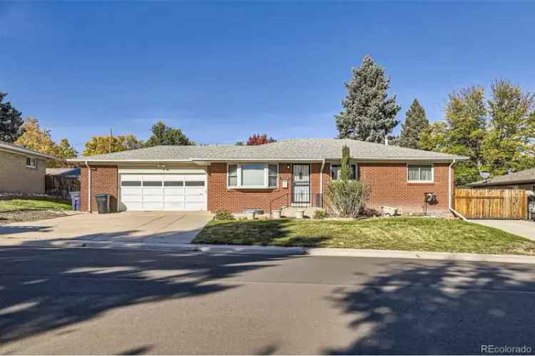 Buy Brick Ranch Home in Centennial Acres with Modern Features and Spacious Yard