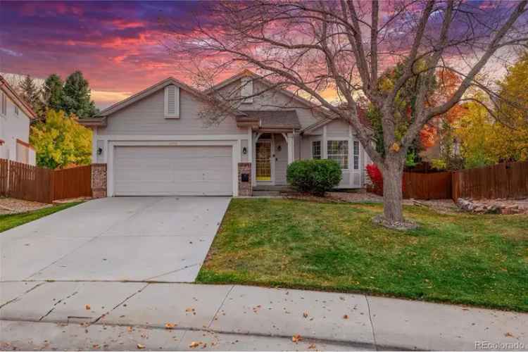 Buy ranch style home in Lone Tree with renovated features and large backyard