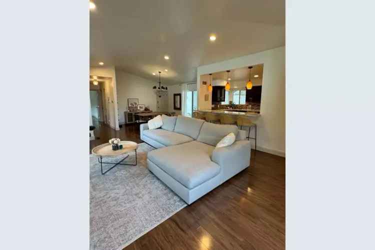 Rent Stunning Corner Lot Home with Bay Views in an Upgraded Suite