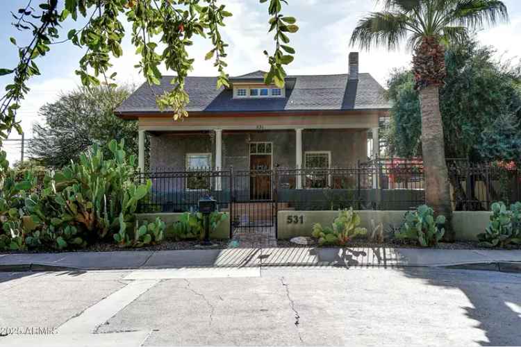 Historic house for sale in Midtown Phoenix with wraparound porch and parking