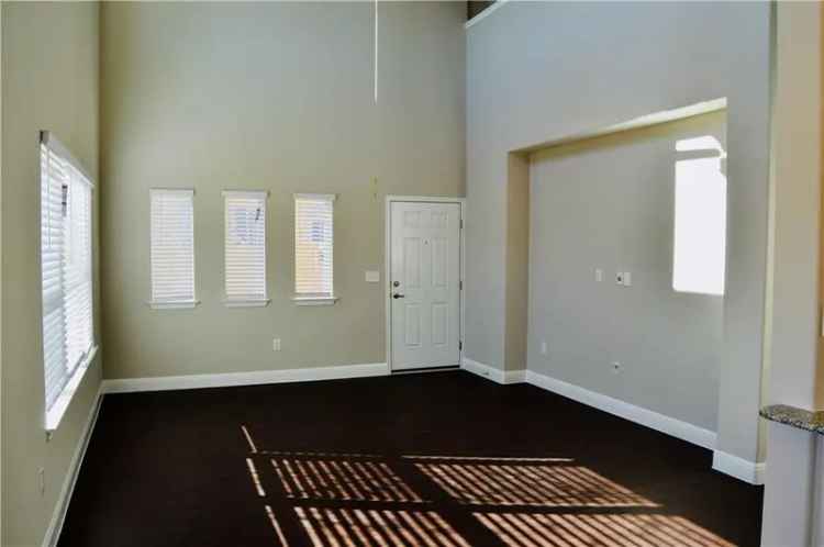 Buy Townhome in Austin with 3 Bedrooms, Media Room, and Fenced Yard