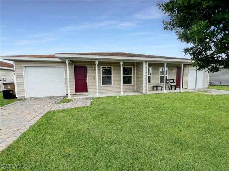 Rent Charming Home in Lehigh Acres with Spacious Layout and Backyard