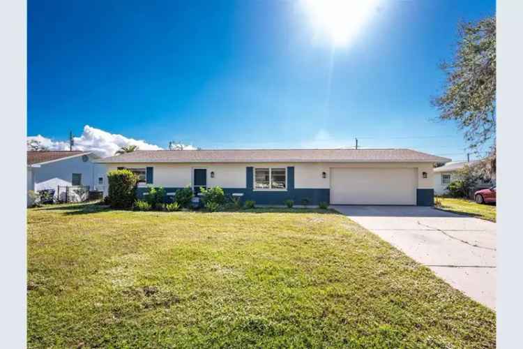 Renovated buy house in Englewood Beach with modern features and charm