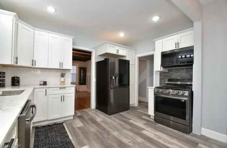 Rent Impeccably Renovated Home in Coventry Neighborhood with Expansive Backyard