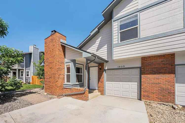 Buy Duplex in Longmont with Updated Kitchen and Backing to Greenbelt