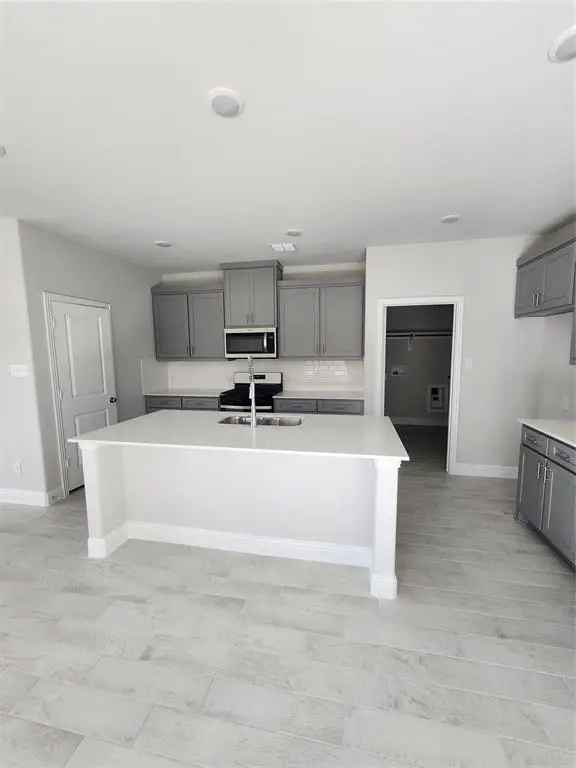 New Construction Rent Becket Plan Home in Anna with Game Room and Quartz Features