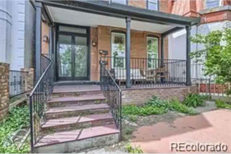 Investment property buy in Historic Curtis Park with two units and charm