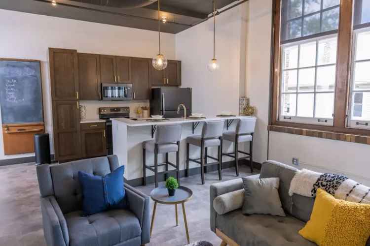 Rent Loft Apartments at Wilkinson Lofts with Historic Luxury Features