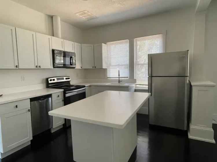 Rent Home in Delaney Park with Open Floor Plan and Hardwood Floors