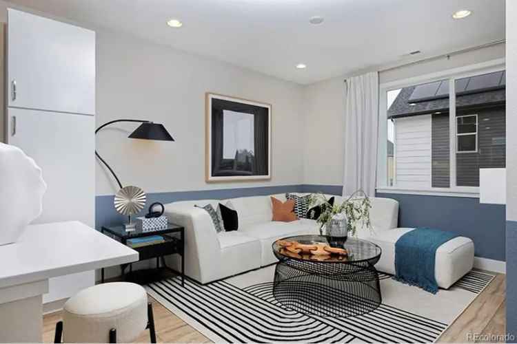 Buy Modern Rowhome in Lyric at RidgeGate with Open Kitchen and Garage