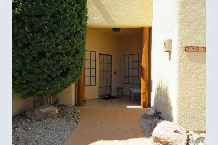 Buy Southwestern Style Home in Kingman with RV Access and Three Car Garage