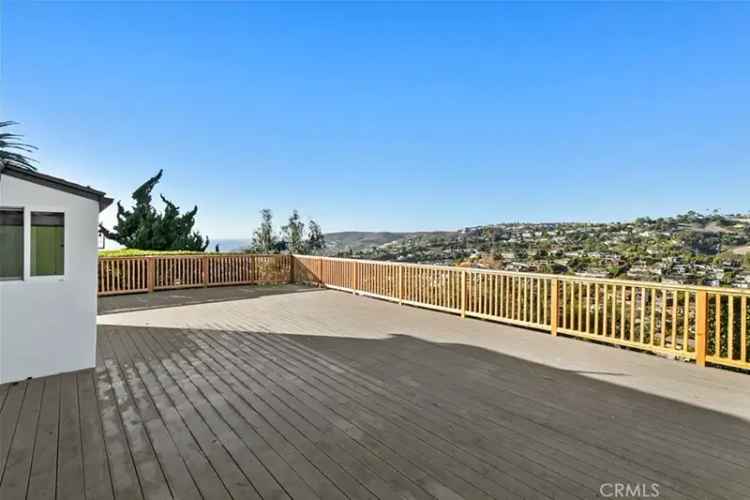 buy house Laguna Beach coastal retreat with ocean views and amenities