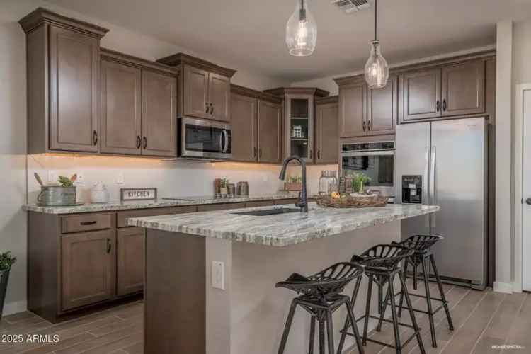 Buy Stunning Aspen Model Home in Waddell with Spacious Interiors and Park Views