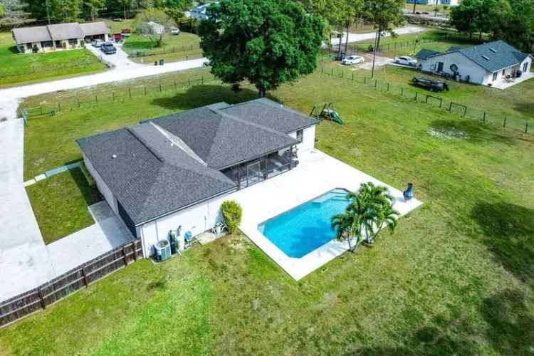 Buy upgraded single family home with pool in Loxahatchee on 1.19 acres