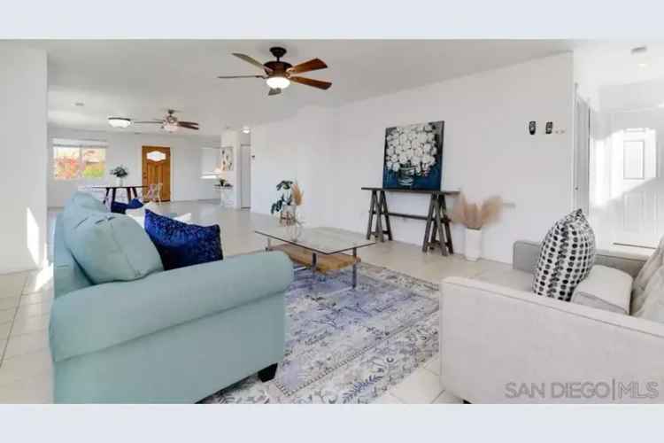 Buy spacious 5 bedroom home in San Diego with paid solar and generous lot