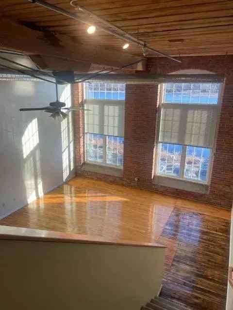 Rent Historic Riverside Apartments with Unique Loft Designs