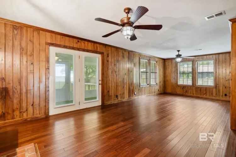 Buy Waterfront Cottage on Mobile Bay with 4 Bedrooms and Spacious Areas