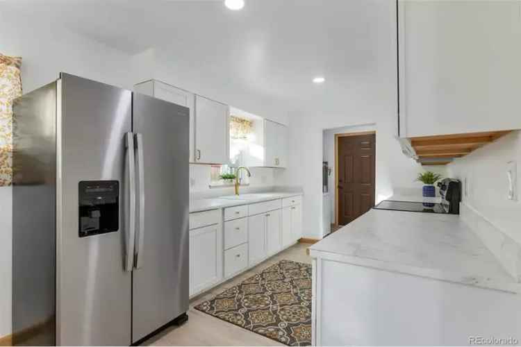 Buy Updated Home in Athmar Park Denver with Spacious Backyard and Modern Features