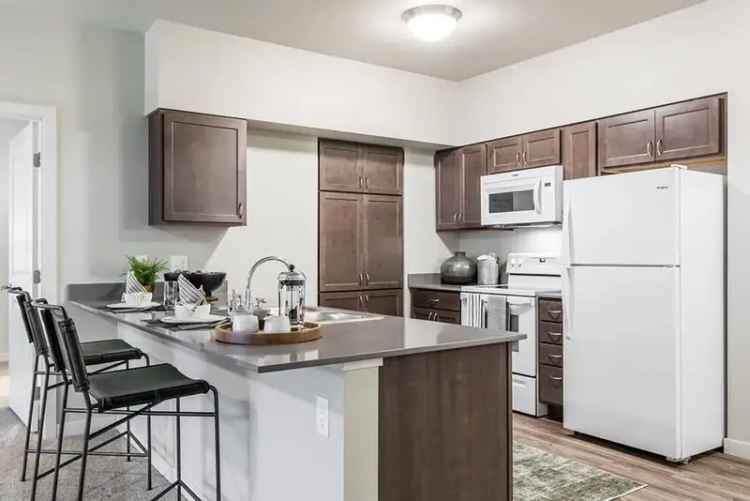 Rent Affinity at Ramsey 55+ Apartments with Vibrant Community Features