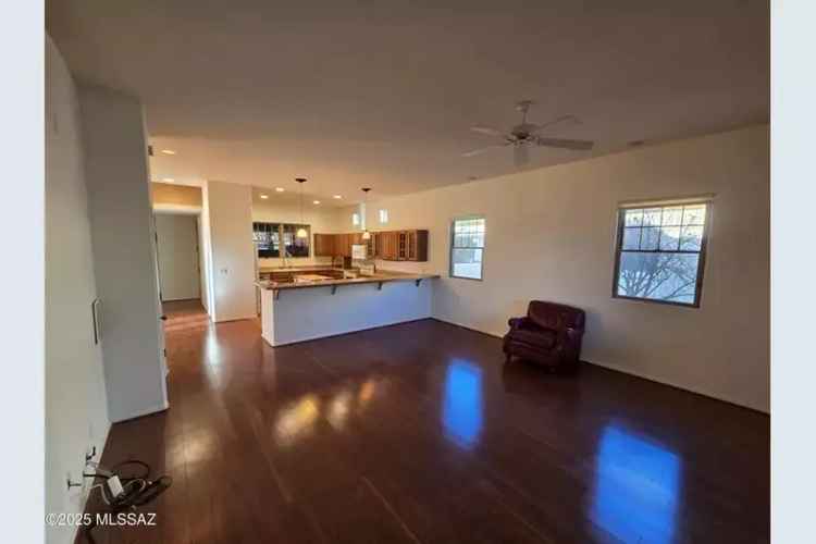 Buy Home in Tucson with Spacious Kitchen and Landscaped Backyard