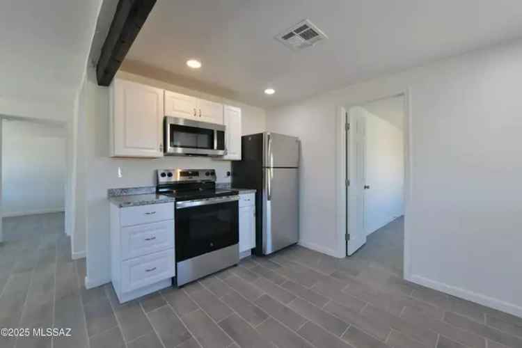 Buy House in a Remodeled 3 Bedroom 2 Bath Home with Yard