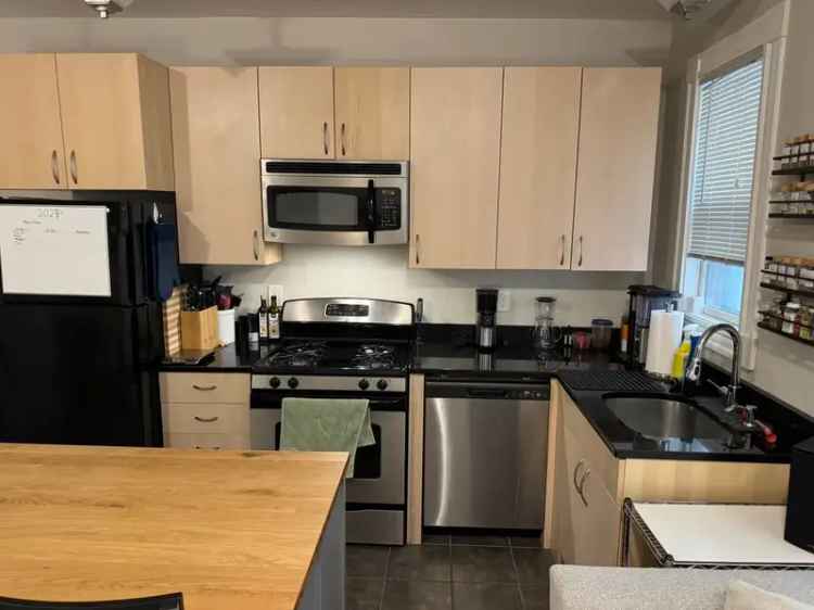 Rent 2 Bedroom Apartment in Davis Square with Modern Kitchen and Laundry