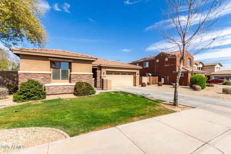 Buy 4 bed home in Palm Valley with great curb appeal and backyard