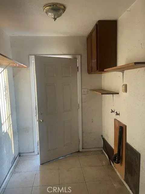 House For Sale in 1410, East 92nd Street, Los Angeles, California