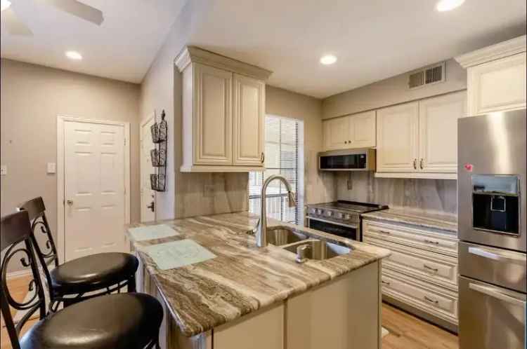 Rent Updated Cozy Condo in Plano with Pool View and Utilities Included