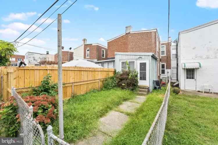 Buy Charming 3 Bedroom Row Home in Tranquil Neighborhood with Backyard