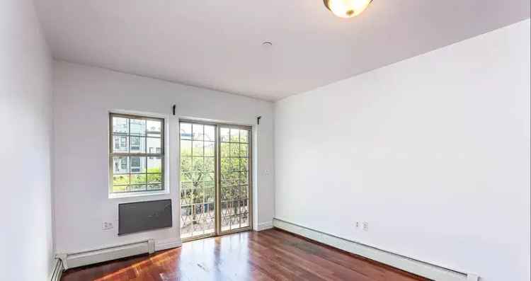 Rent Spacious Apartment Unit in Bushwick with Laundry and Roof Access