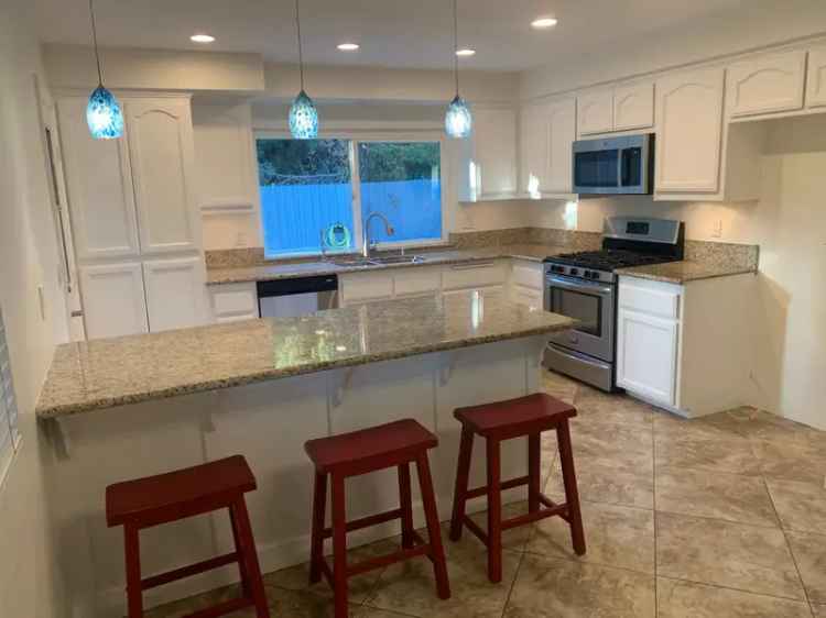 Rent 4 Bedrooms House with Backyard and Pool in Orange Unified School District