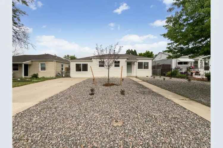 Buy Beautifully Updated House with Modern Kitchen and Fenced Backyard