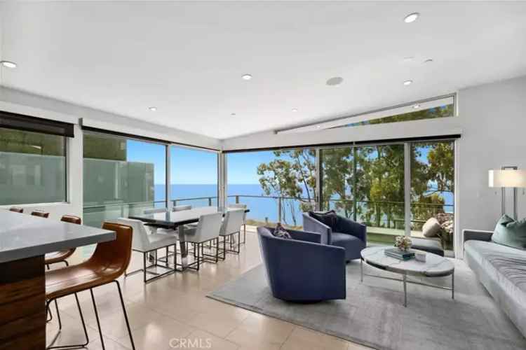 buy house Laguna Beach with magnificent ocean views and private backyard