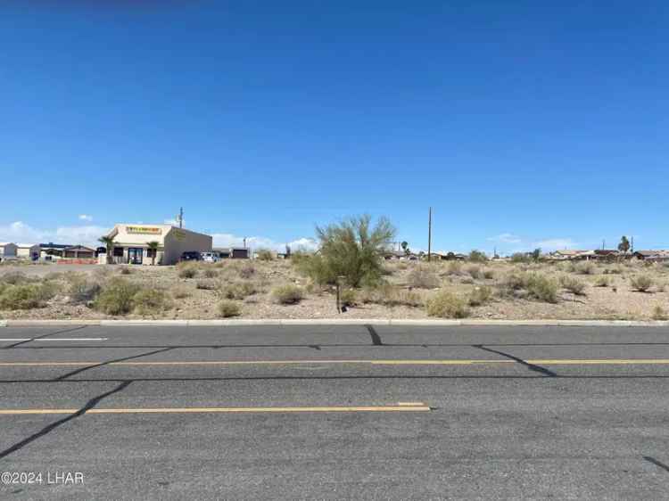 Buy Vacant Commercial Lot with Plans in Convenient Location