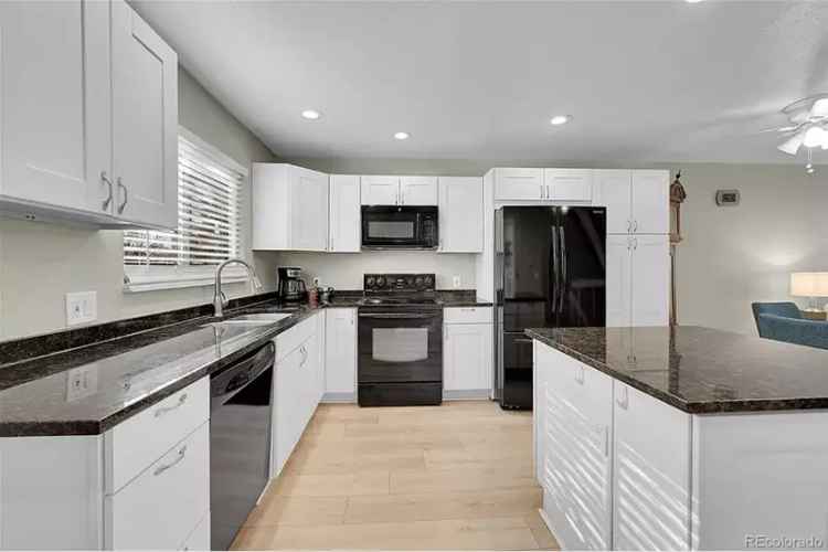 Buy Townhouse in Denver with Modern Updates and Community Amenities