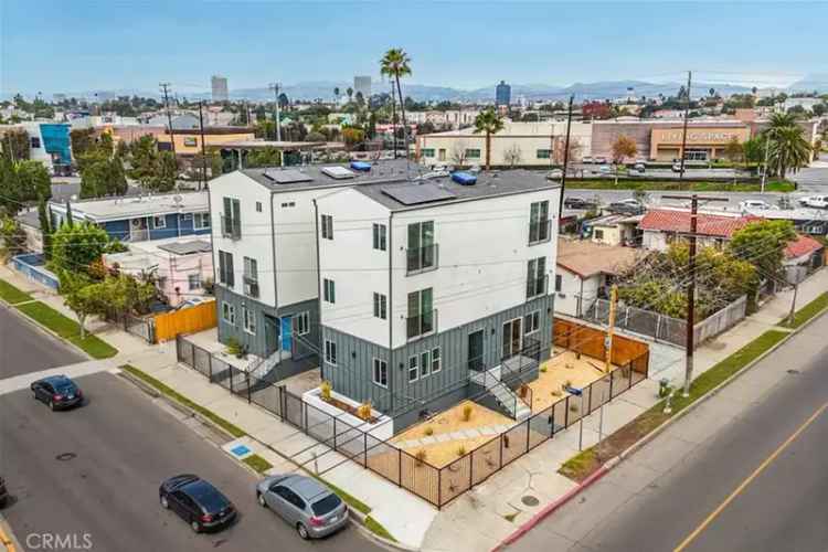 Buy luxury triplex in Mid-City Los Angeles with rental potential