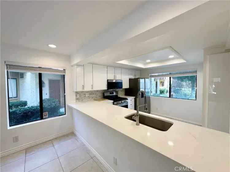 Buy Waterfront Townhouse in Warner Center with Remodeled Kitchen